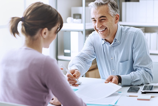 Rewards and benefits, manager discussing with an employee